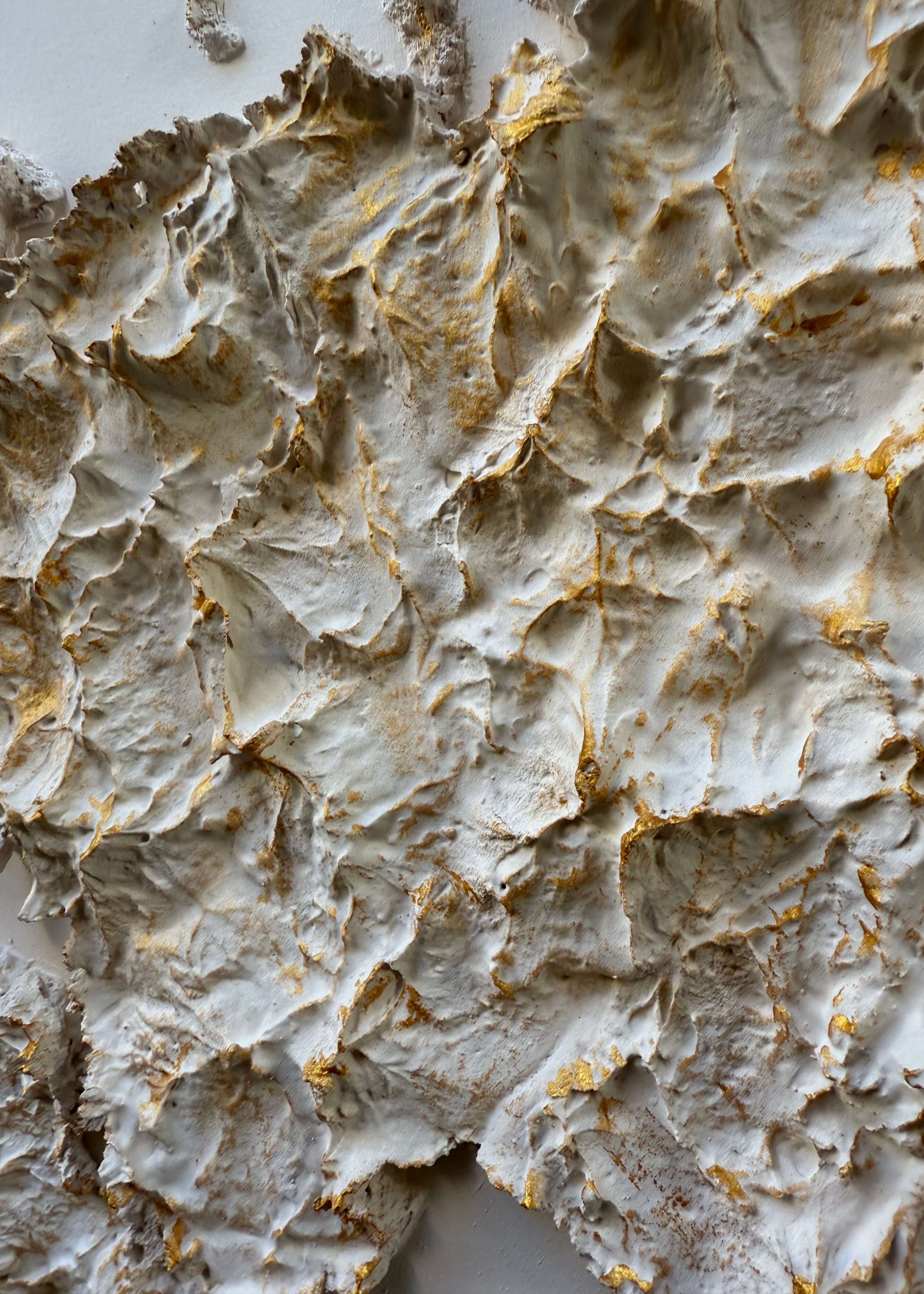 Cream and gold relief world map