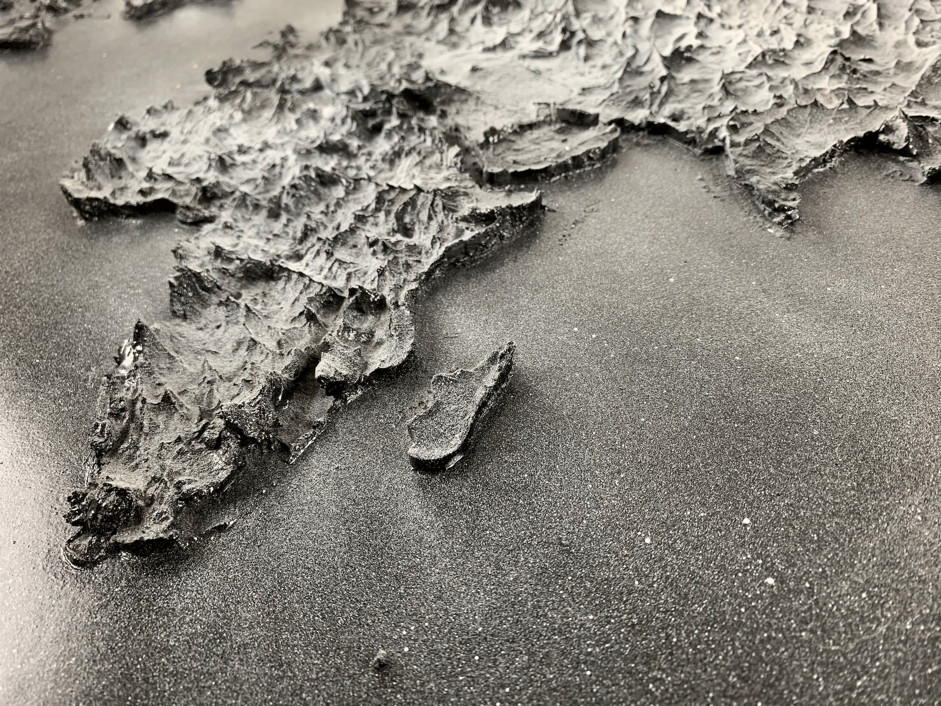 Black and white world map painting in relief